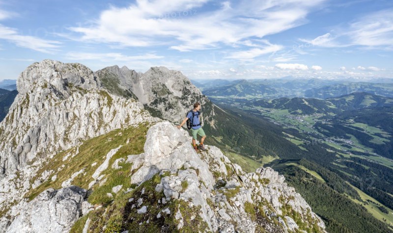 Mountaineer on a ridge path