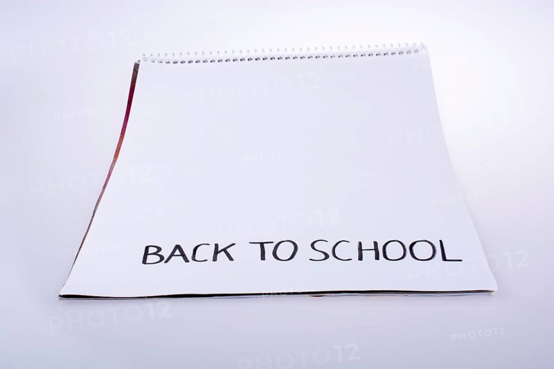 Notebook and back to school title on a notebook