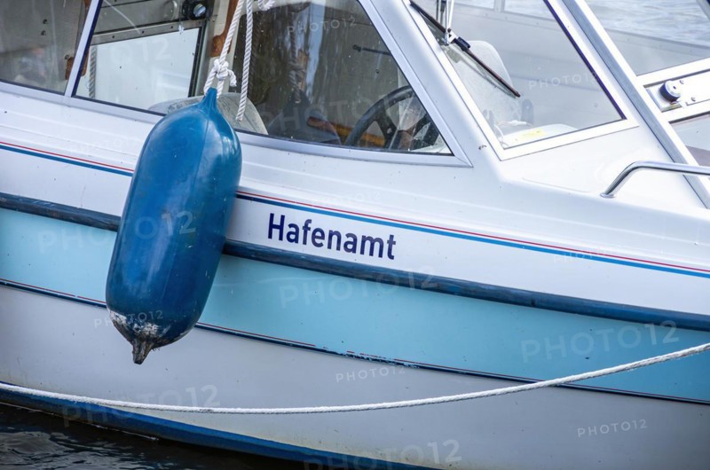 Boat detail with the inscription HAFENAMT in the city harbour of Greifswald-Wieck