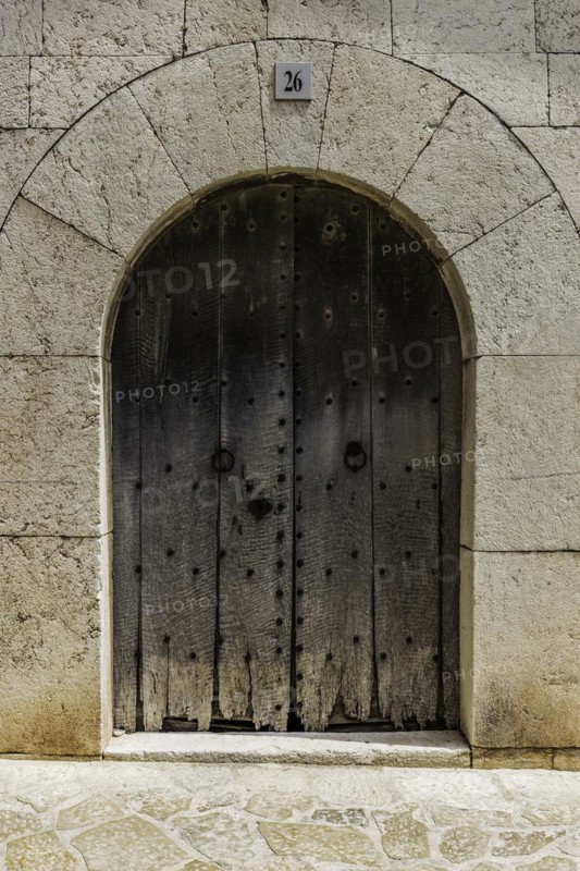 Old wooden door in wall