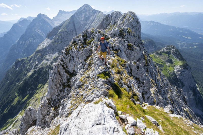Climbers at the summit of the Upper Wettersteinspitze