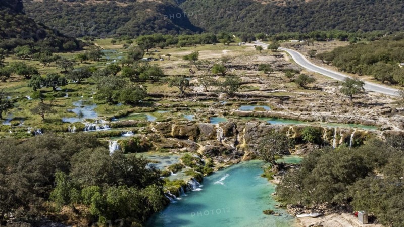 Aerial of turquoise waterfalls