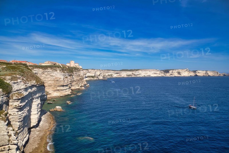 Steep coast of Bonifacio with old town on a limestone plateau