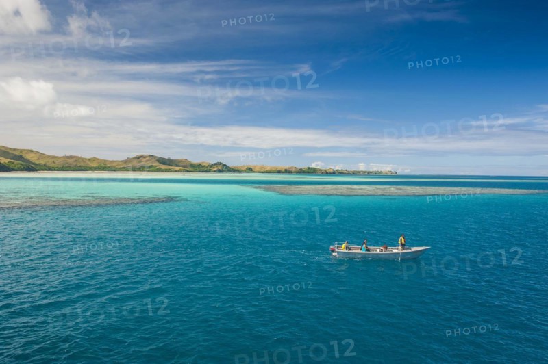 Little boat in the blue lagoon