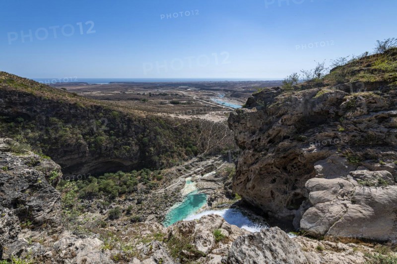 Huge waterfall with turquoise rockpools
