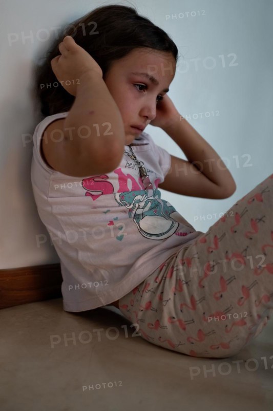 Bored little girl in isolation at home during quarantine COVID 19 Outbreak. Mental health Impact of coronavirus lockdown and social distancing