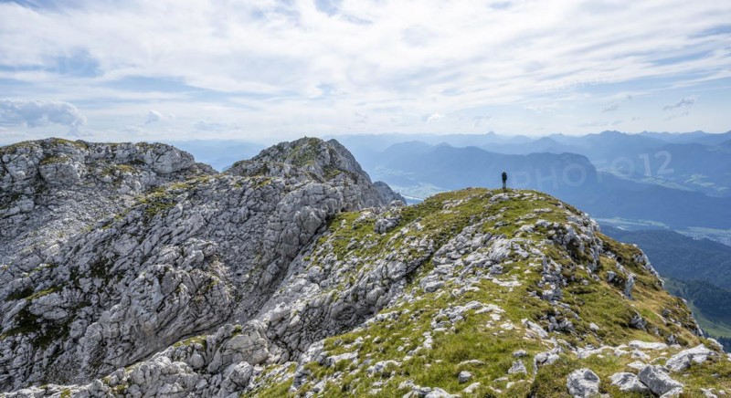 Mountaineer on a ridge path