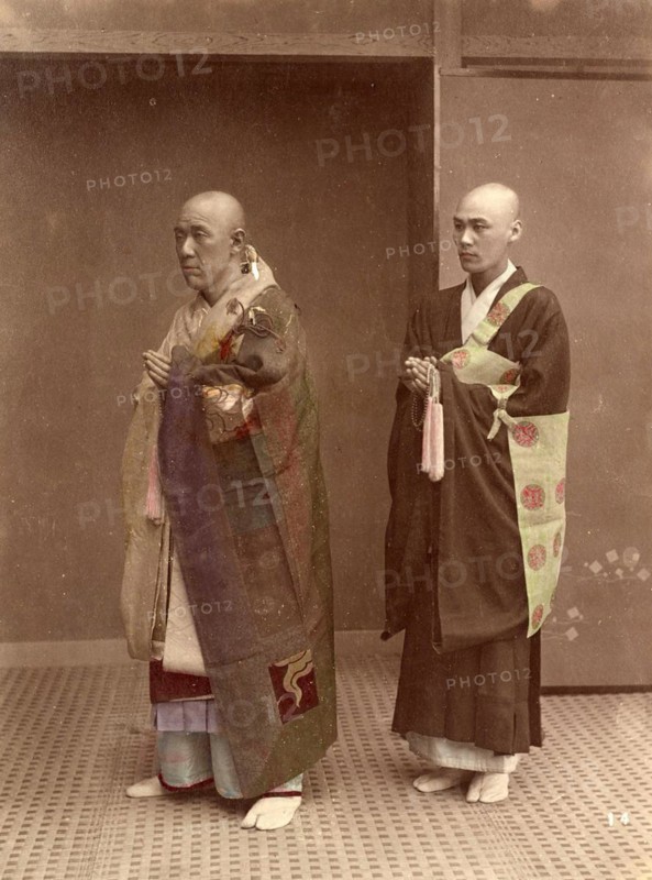 Two Buddhist monks on their way to the monastery