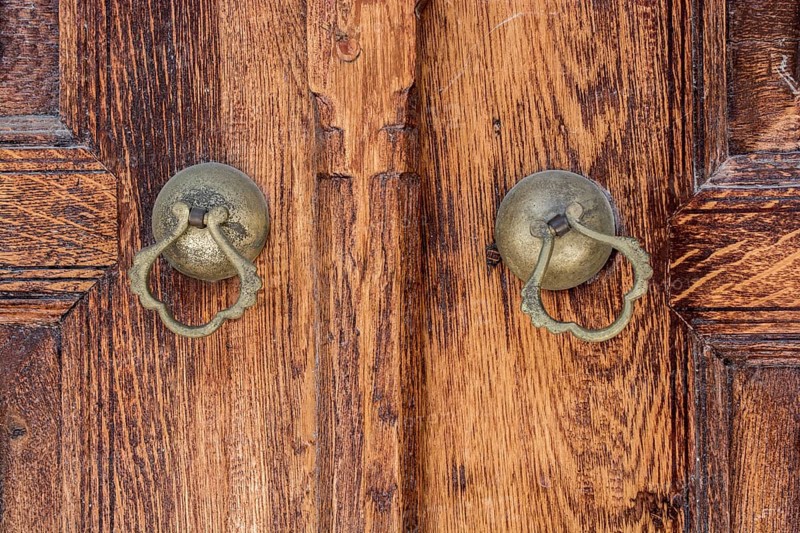 Old Handmade ottoman door knob on wood