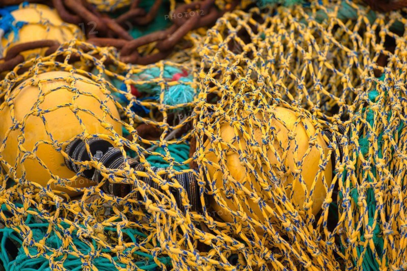 Fishing nets and buoys in the harbour of Guilvinec