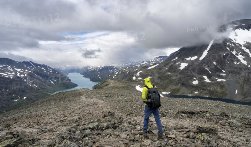 Climbers on stony trail