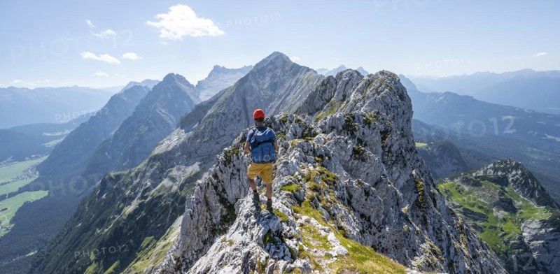 Climbers at the summit of the Upper Wettersteinspitze