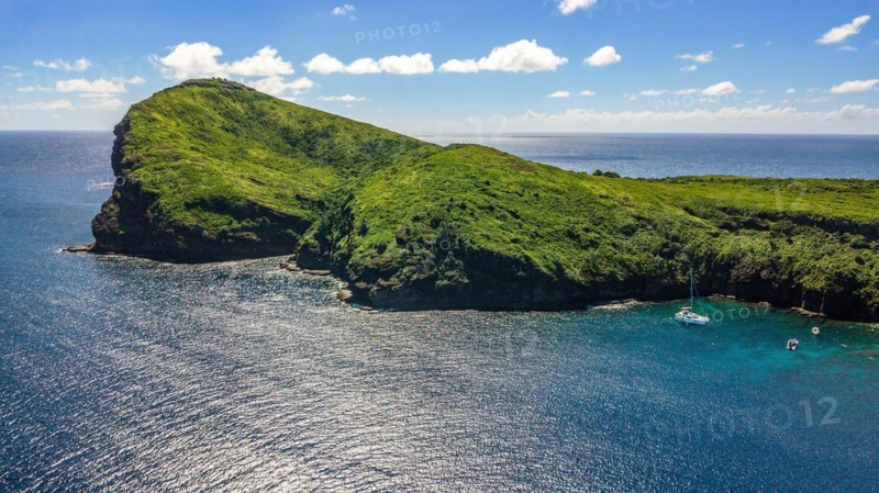 Aerial view of bird's eye view on western part of Isle de Coin de Mire Gunner's Coin Island off north coast of Mauritius in Indian Ocean