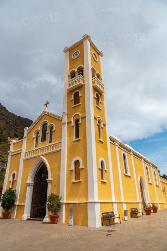 Lovely yellow church of La Encarnacion in the village of Hermigua in the north of La Gomera