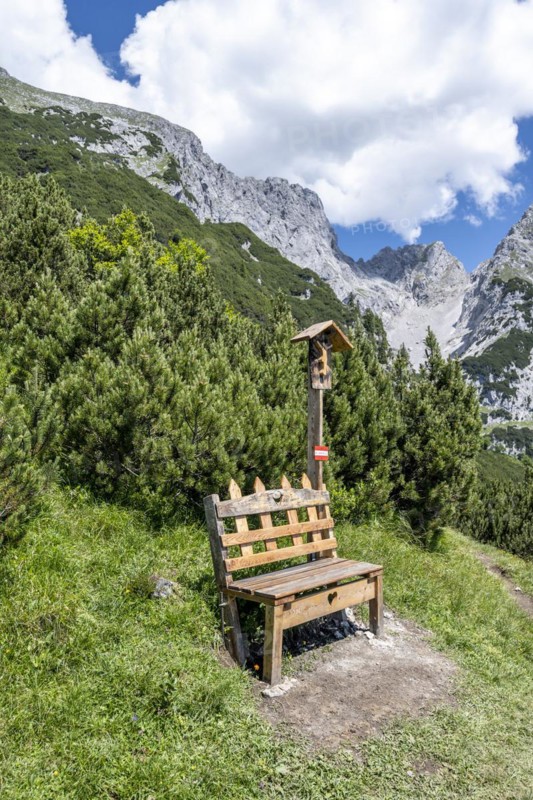 Bench and wayside shrine
