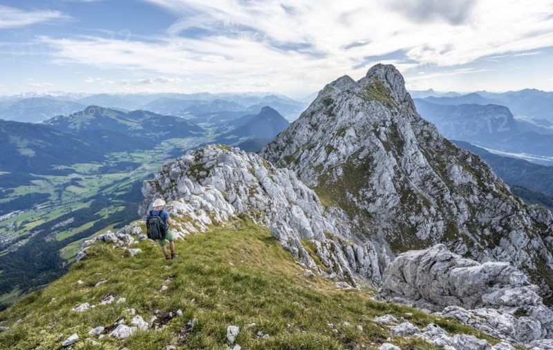 Mountaineer on a ridge path