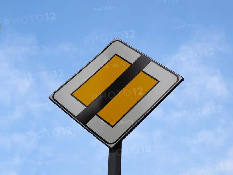 End of priority road sign
