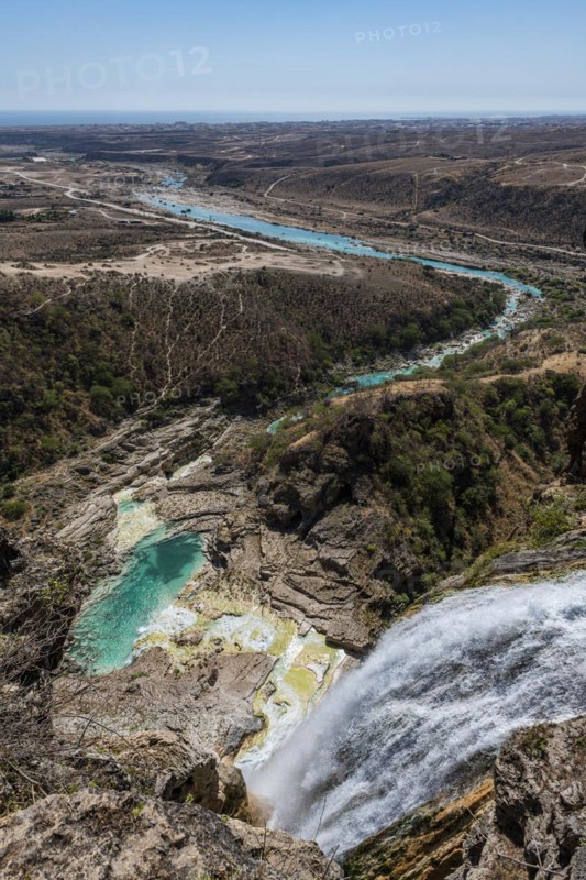Huge waterfall with turquoise rockpools