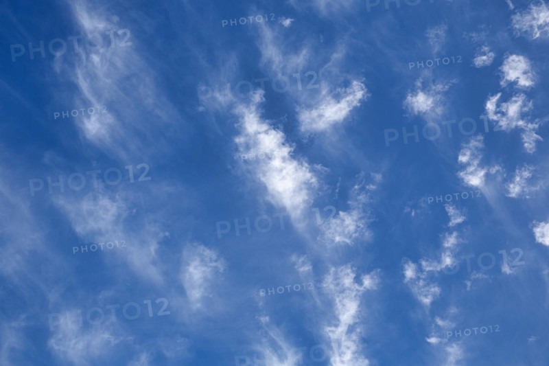 Feathery clouds in a blue sky