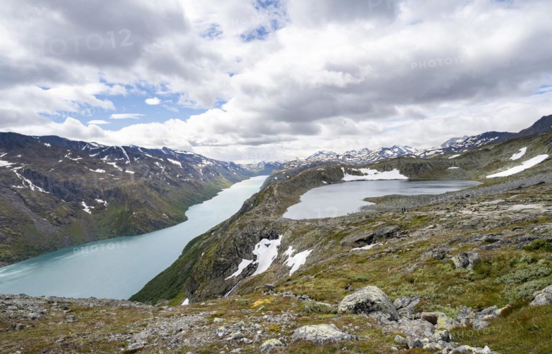 View of lake Gjende with mountains and lake Bjornboltjonne