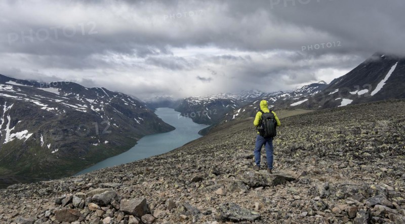 Climbers on stony trail
