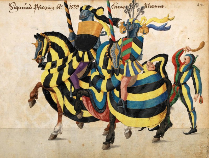 Knight on horseback in decorative armour at a jousting tournament
