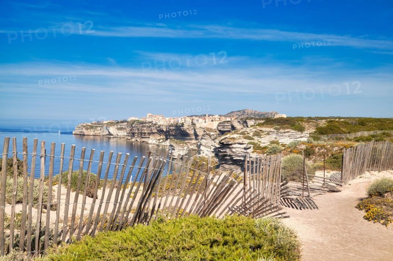 Steep coast of Bonifacio with old town on a limestone plateau