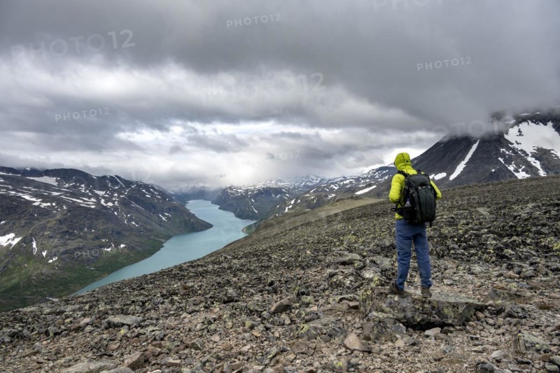 Climbers on stony trail