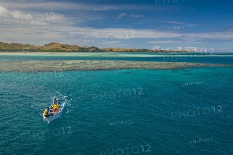 Little boat in the blue lagoon