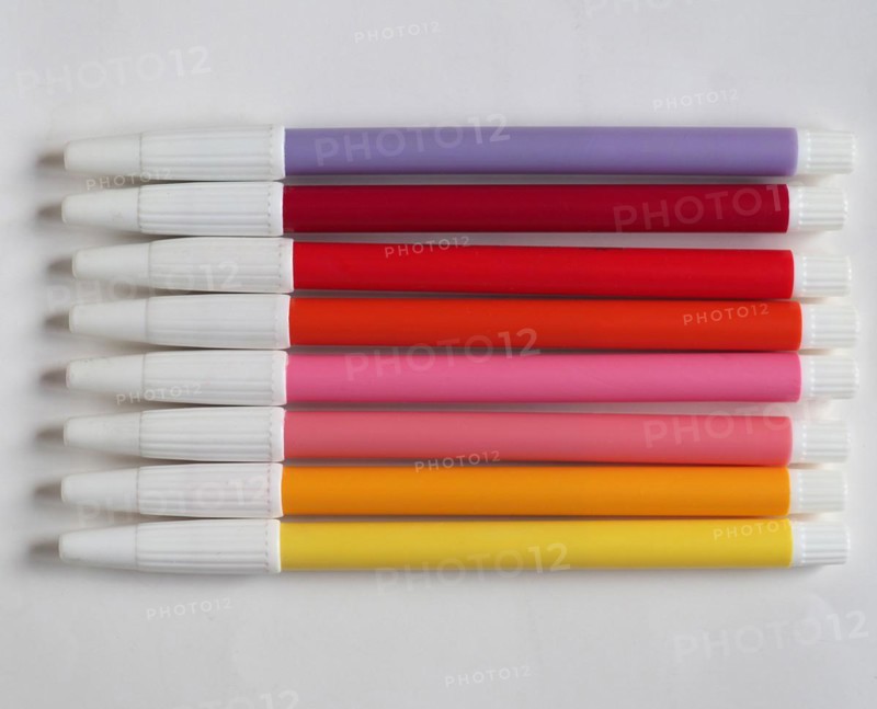Purple red pink and yellow felt tip pen