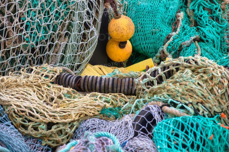 Fishing nets and buoys in the harbour of Guilvinec