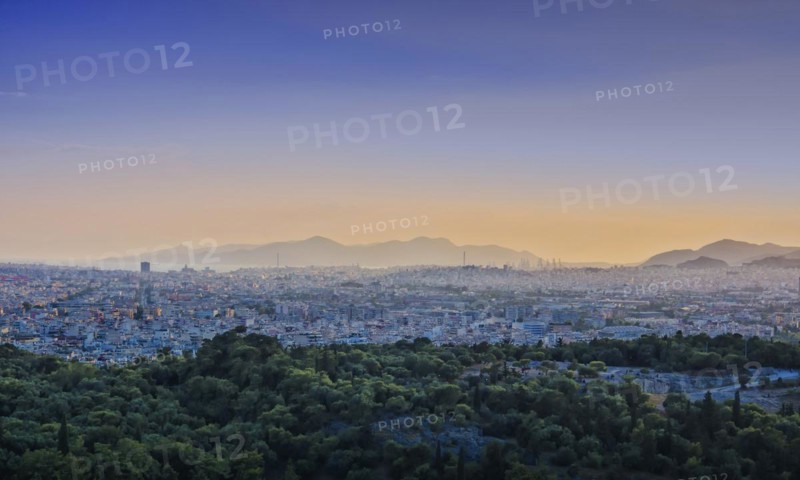 View of Athens and Pireus port from Acropolis hill against sunset