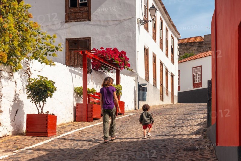Mother and son visiting the village of Agulo in the north of La Gomera on vacation