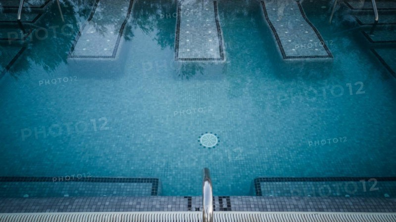 Swimming pool in a hotel with a relaxation zone