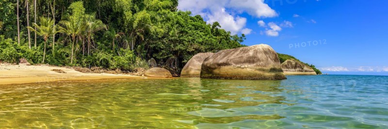Panoramic image of a deserted and paradisiacal beach on Ilha Grande on the green coast in the south of the state of Rio de Janeiro