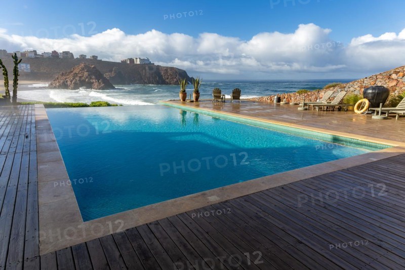 Infinity swimming pool overlooking Atlantic Ocean