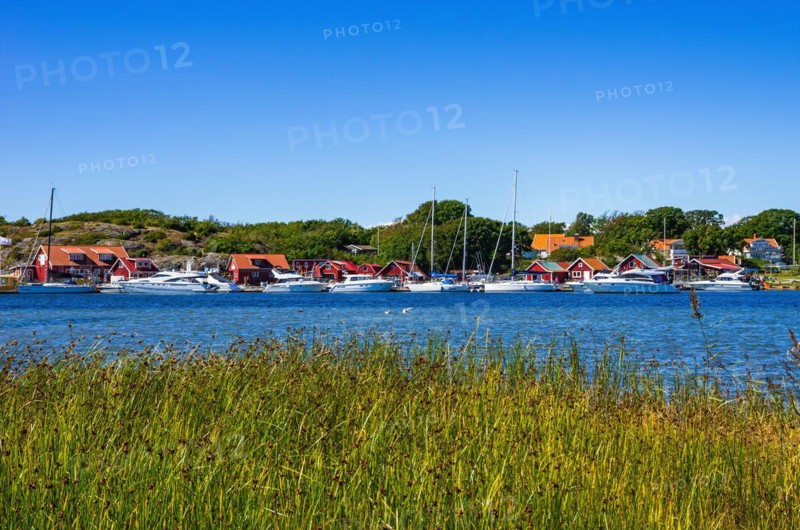 Picturesque coastal landscape with maritime structures and the sound between the islands of South and North Koster