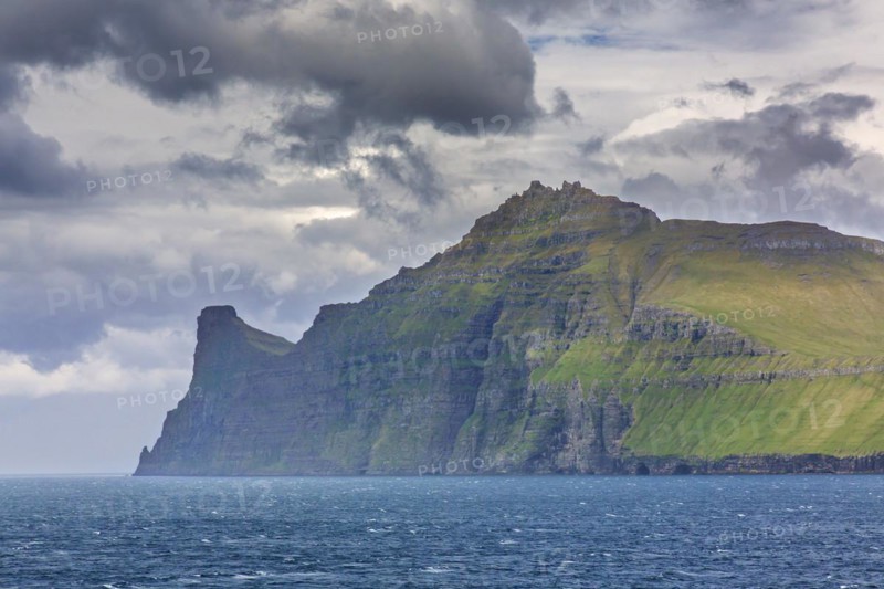 Sea cliffs along the rugged coast of Eysturoy