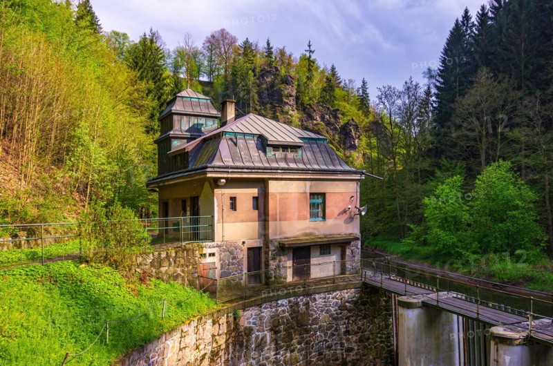 Old hydroelectric power plant power station from 1926 on the Rieger Trail in the valley of the Jizera River near Bitouchov