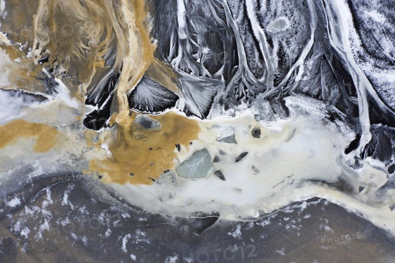 Aerial view over the glacial Virkisa River basin along the Glacier Falljoekull in winter in Austurland