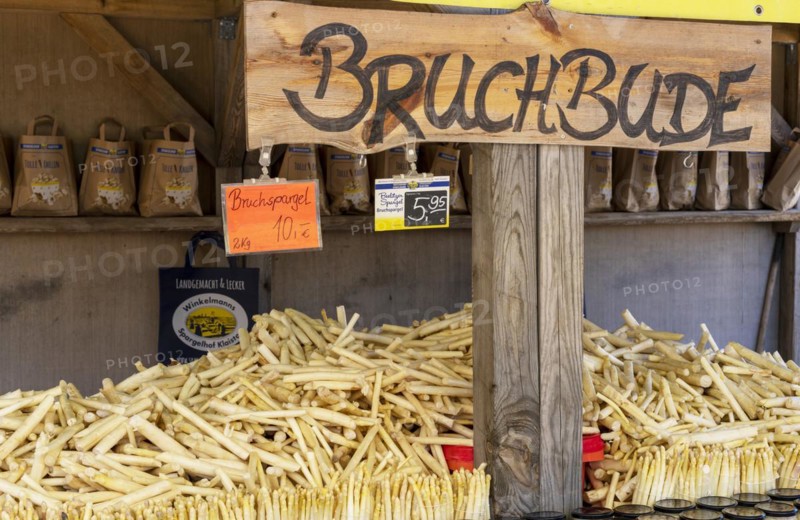Market stall with fresh asparagus