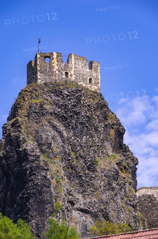 View of the remains of one of the twin towers of Trosky Castle in its picturesque rural setting in Rovensko pod Troskami