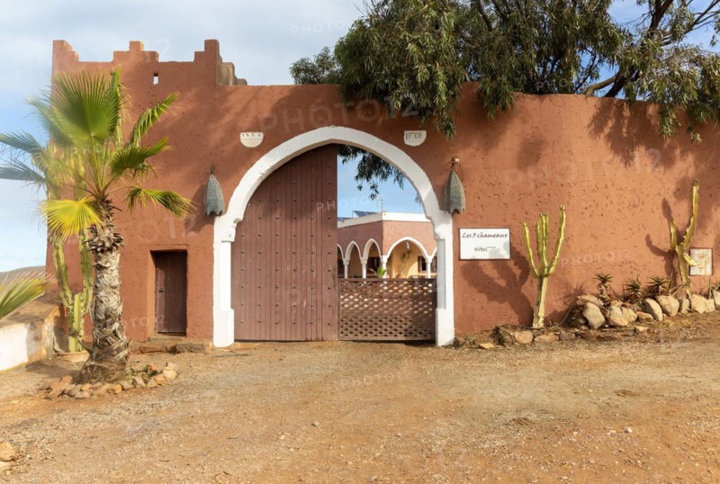 Entrance doorway to historic Les 3 Chameaux hotel