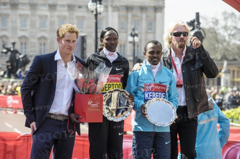 Prince Harry presents medals to the Elite mens and womens winners Tsegaye Kebede and Priscah Jeptoo at the Virgin London Marathon Medal Presentations on 21.04.2013 at The Mall
