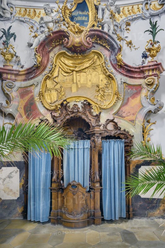 Richly carved confessional