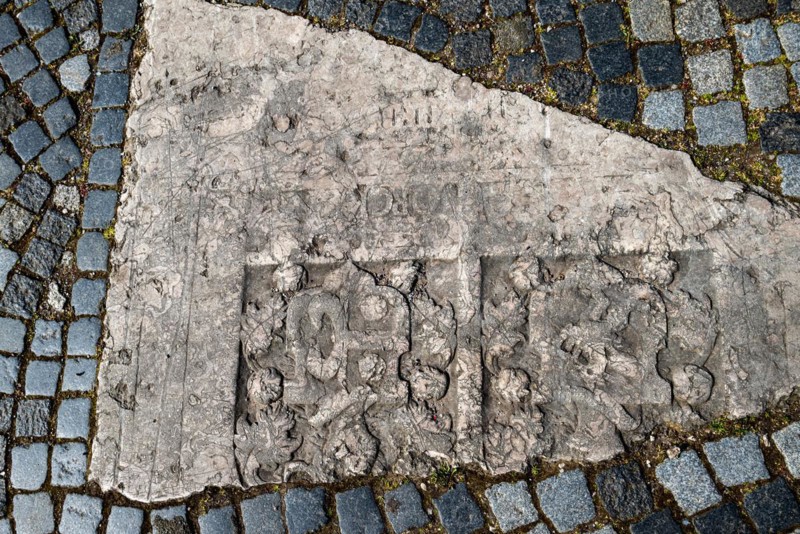 Historic gravestones in the pavement in front of St. Nicholas Church