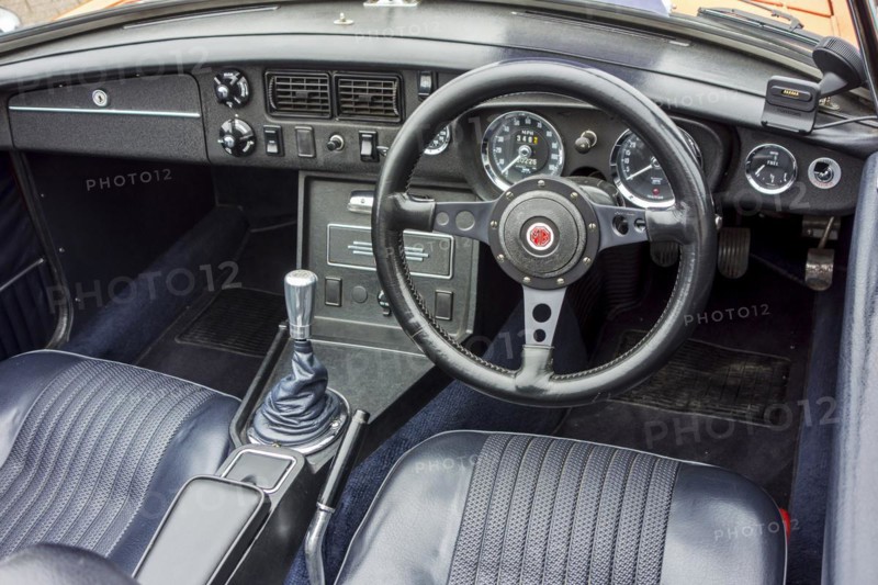 Steering wheel and dashboard of a classic 1972 MG MGB Roadster sports car
