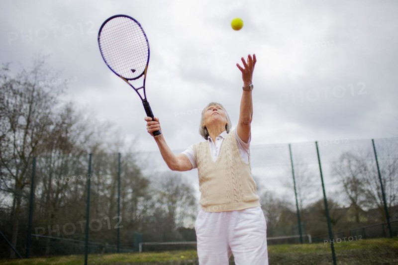Subject: Woman aged 82 standing on the tennis court