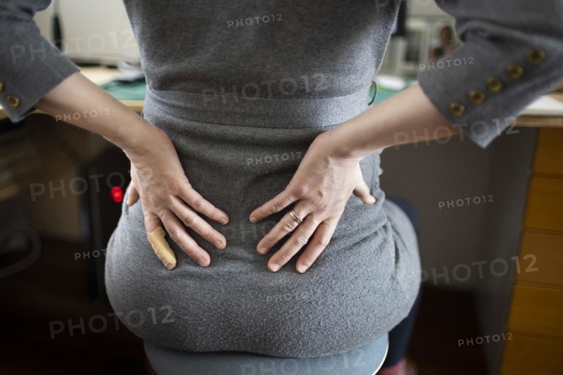 Young woman in pain