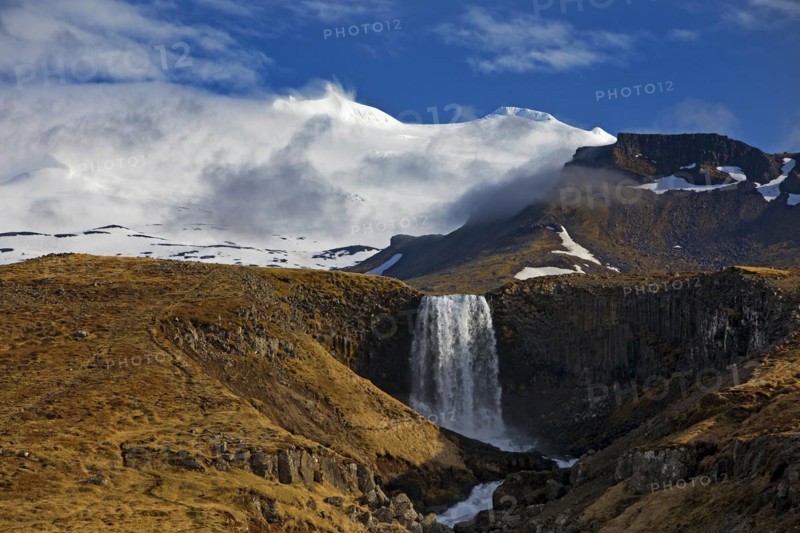 The Snaefellsjoekull with the Svoedufoss waterfall